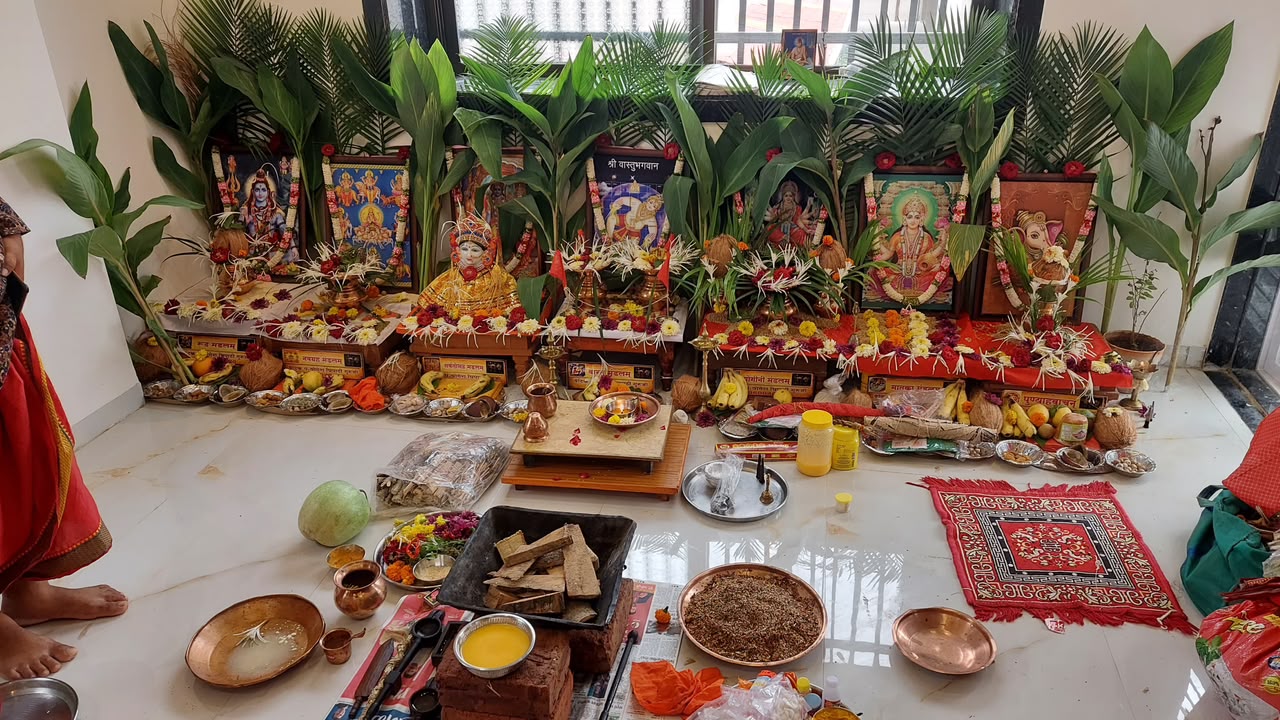 Navgrah and other puja mandals arranged with flowers and kalash